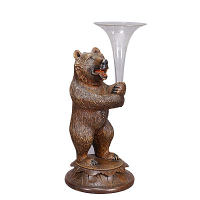 A Wooden Carved Black Forest Bear with Glass Vase.